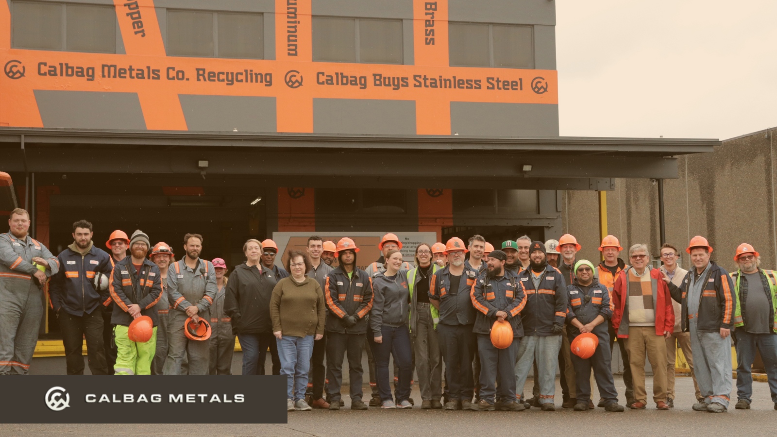 Calbag Team Photo Taken in front of Calbag Metals work place in Portland